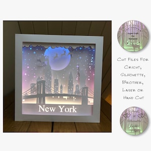 Caja de sombras recortada en papel, caja de luz 3D SVG PNG, Papá Noel sobre Nueva York, silueta de Cricut, archivos de corte de tarjetas en capas con láser cortados a mano
