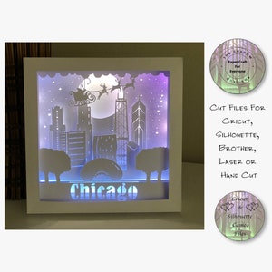 Scatola di ombre tagliate in carta 3D Lightbox SVG PNG Babbo Natale su Chicago Cricut Silhouette File di taglio a mano con laser a strati