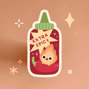 May include: A red and white hot sauce bottle sticker with a cartoon fire character and the text "EXTRA SPICY".