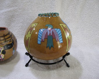 One of a Kind ! ! !   This Beautiful Gourd clearly depicts a medley of 3 different interpretations of the mysterious Thunderbird.