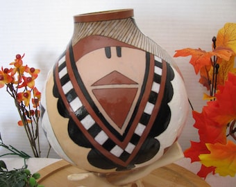 Zuni Pottery Gourd:  Hand Painted Butterfly Design with intricate designs and symbolic representations in pottery fashion.