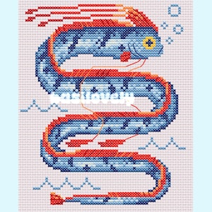 Puede incluir: Una taza de cerámica blanca con un asa negra y el texto "But First, Coffee" en negrita negra. La taza está sobre una superficie blanca. La taza mide 10 cm de alto.