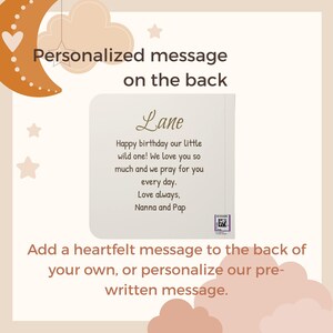 May include: A square white card featuring the name Lane in a cursive script, followed by the printed text: Happy birthday our little wild one! We love you so much and we pray for you every day. Love always, Nanna and Pap. A small QR code is visible.