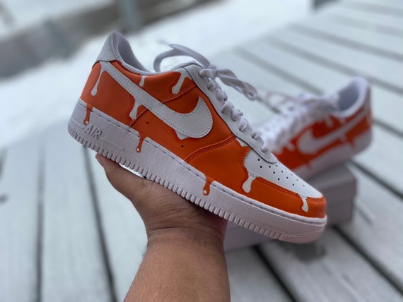orange drip sneakers