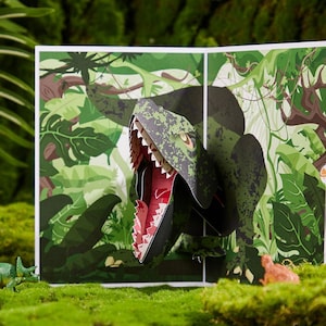 Tarjeta de felicitación emergente 3D de dinosaurio Giganotosaurus