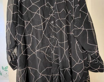 Lage black translucent long sleeved button down shirt with sparkles