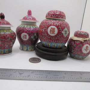 4 vintage Chinese red mun shou covered jars