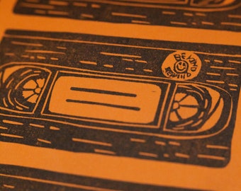 VHS Tape Linocut Art Print (Orange)