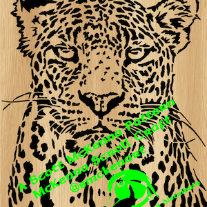 May include: A black and white silhouette of a leopard's face with a wood grain background. The text "A Scott McKenna Pattern McKenna Scroll Craft @smckenart Please Do not sell or distribute" is visible in the image.