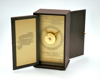 Antikythera Mechanism replica at 1:2 scale, with booklet