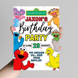 May include: A colorful birthday party invitation featuring Sesame Street characters. The invitation includes the text "Jaxon's Birthday Party" with the date, time, and location: 111 Sesame St., New York City, NY.