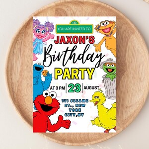 May include: A colorful birthday party invitation featuring Sesame Street characters. The invitation reads "Jaxon's Birthday Party" with the date and time. The design includes Elmo, Cookie Monster, and Big Bird.