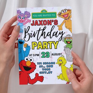 May include: A colorful birthday party invitation featuring Sesame Street characters. The invitation reads "Jaxon's Birthday Party" with the date and time. The address is 111 Sesame St., New York City, NY. The invitation is held by a person.