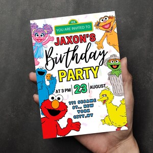 May include: A colorful birthday party invitation featuring Sesame Street characters. The invitation includes the text "Jaxon's Birthday Party" with the date, time, and location: 111 Sesame St., New York City, NY.
