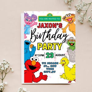 May include: A birthday party invitation featuring Sesame Street characters. The invitation reads "Jaxon's Birthday Party" with the date and time. The invitation includes images of Elmo, Cookie Monster, Big Bird, and other characters.