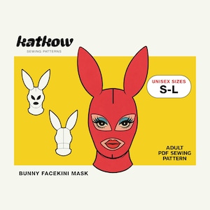 Peut inclure: Un masque de visage de lapin rouge avec de longues oreilles, illustré sur un fond jaune. Le masque a un maquillage des yeux détaillé et une forme de lèvres définie. L'image comprend le texte "katkow SEWING PATTERNS" et "BUNNY FACEKINI MASK".