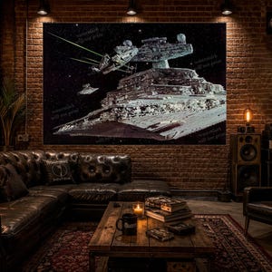 May include: A large rectangular wall art print featuring a detailed space scene with a grey Star Destroyer spaceship and a smaller spacecraft engaged in a battle with green laser beams against a dark starry background, displayed in a room.