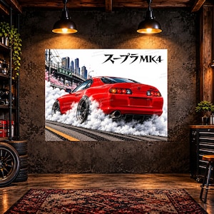 May include: A wall art print featuring a bright red Toyota Supra MK4 sports car drifting on an asphalt road, surrounded by thick white tire smoke. The background shows a city skyline and cherry blossoms. The text reads "スープラMK4".