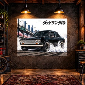 May include: A black Datsun 510 car drifting on a track with white tire smoke, set against a city skyline background with cherry blossoms and a green road sign. The text "ダットサン510" is printed in black at the top right of the image.