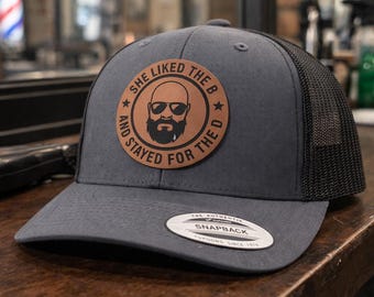 She Liked the B, Leather Patch Trucker Hat – Beard Design