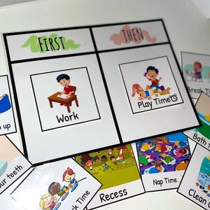 May include: A set of educational cards for children, featuring illustrations and text. The main card is divided into two sections labeled "FIRST" and "THEN", with images of "Work" and "Play Time". Additional cards show "Snack Time", "Recess", and "Nap Time".
