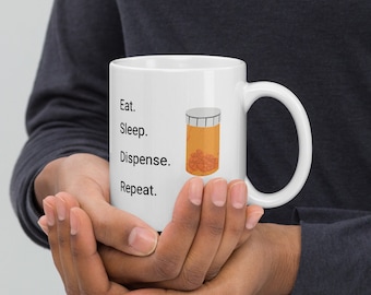 Eat Sleep Dispense Repeat mug. 11 oz