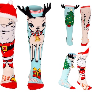 May include: A pair of Christmas themed knee-high socks. One sock features a Santa Claus design with the text "ho ho ho" and the other sock features a reindeer design with the text "Jingle all the way".