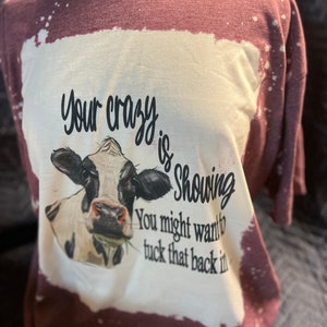 It looks like your crazy is showing….bleached sublimation t-shirt, graphic T-shirt, women&#39;s shirt, funny shirts, tee shirts, Heifer Shirt