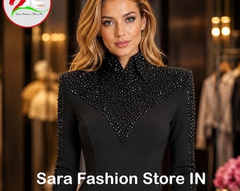 May include: A black long-sleeved bodysuit featuring a high collar and a V-shaped yoke embellished with black beads and crystals. The sleeves are adorned with vertical lines of black beads. The text Sara Fashion Store IN is visible.