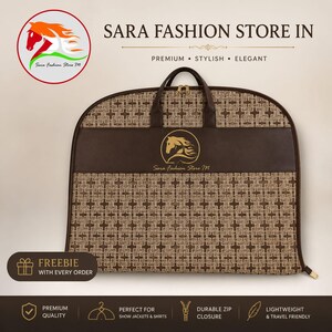 May include: A brown garment bag featuring a repeating geometric pattern and a solid brown horizontal band with a gold horse logo and the text Sara Fashion Store M. The bag has two top handles, a zipper closure, and a circular logo in the corner.