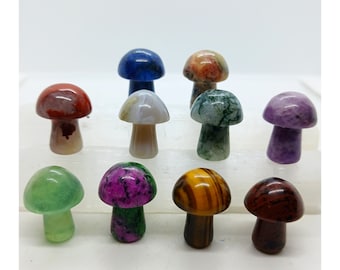 May include: A collection of ten small, polished gemstone mushroom figurines. The mushrooms are made of various types of stones, including red, green, purple, blue, and brown.