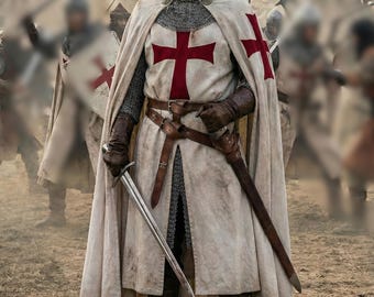 May include: A warrior dressed in a cream-colored tunic and hooded cloak featuring a prominent red cross on the chest and shoulders. The attire includes chainmail, brown leather gloves, a leather belt with a scabbard, and a steel sword held in hand.