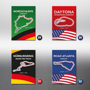 May include: Four colorful magnets featuring famous race tracks. Each magnet has a black and white outline of the track, a red, white, and blue American flag, and the name of the track. The magnets are numbered 29, 30, 31, and 32.