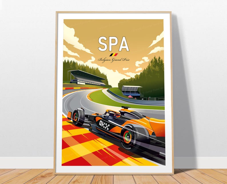 Puede incluir: Un p&oacute;ster enmarcado que muestra un coche de F&oacute;rmula 1 naranja y negro con la marca OKX, conduciendo en el circuito de Spa-Francorchamps. El texto dice SPA y Belgian Grand Prix, con una peque&ntilde;a bandera belga bajo un cielo dorado.