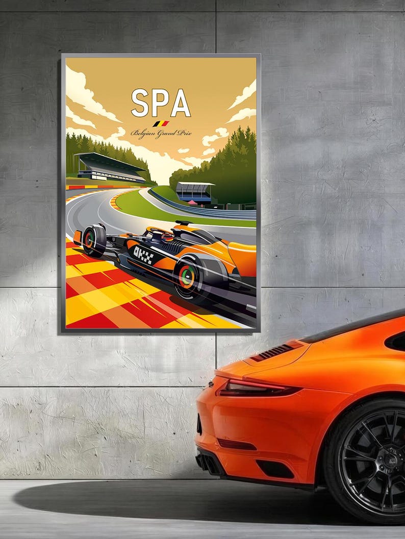 Puede incluir: Un p&oacute;ster enmarcado con un coche de carreras de F&oacute;rmula 1 en una pista, con el texto "SPA Belgium Grand Prix". El coche es naranja y negro, y el p&oacute;ster tiene un estilo vintage. Un coche deportivo naranja est&aacute; aparcado junto al p&oacute;ster.