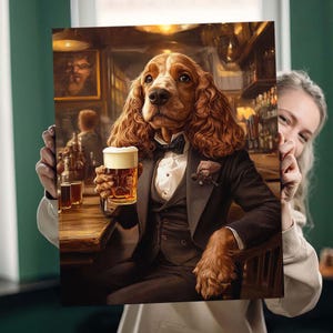 Custom royal dog portrait of a Cocker Spaniel dressed as a Victorian gentleman sitting in a cozy pub. The dog wears a classic black tuxedo with a bow tie and holds a glass of beer, styled in Renaissance-inspired artwork. Warm lighting, vintage bar background, and detailed painterly texture create a humorous yet elegant pet portrait. Perfect example of a custom pet portrait on canvas for dog lovers seeking unique, personalized wall art.