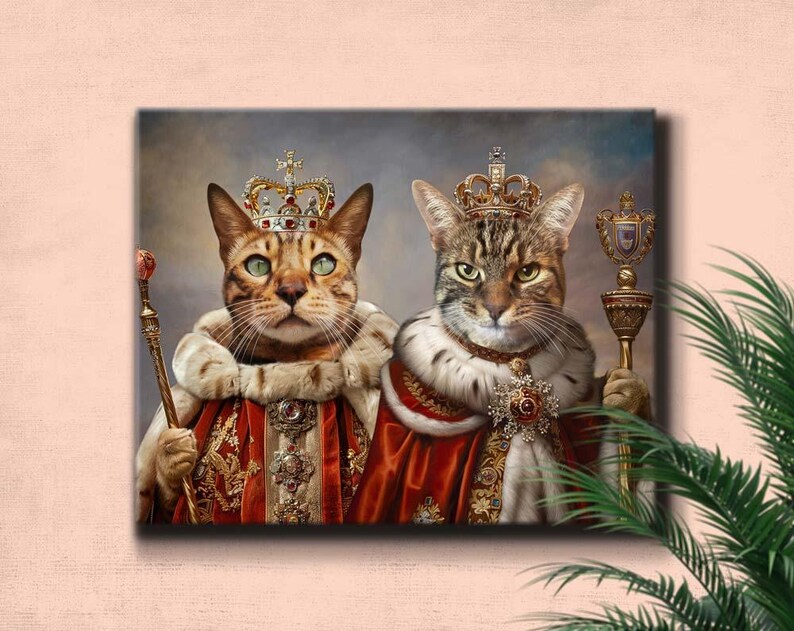 May include: A canvas print featuring two regal cats adorned with crowns, royal robes, and scepters. One cat has green eyes and the other has brown eyes. The artwork has a vintage aesthetic with a soft, neutral background.
