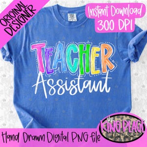 May include: A blue t-shirt with the words "TEACHER ASSISTANT" in colorful, outlined letters. The shirt has a crew neck and short sleeves. The text "Instant Download 300 DPI" is also visible.