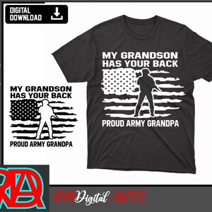 May include: A black t-shirt with a white design featuring an American flag with a soldier standing in front of it. The text "My Grandson Has Your Back" is above the flag and "Proud Army Grandpa" is below the flag.