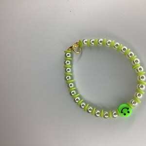 Green smiley faced bracelet