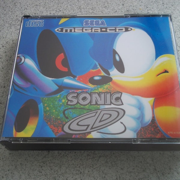 mega cd de sega: CD de SONIC/carcasa personalizada e ilustraciones.