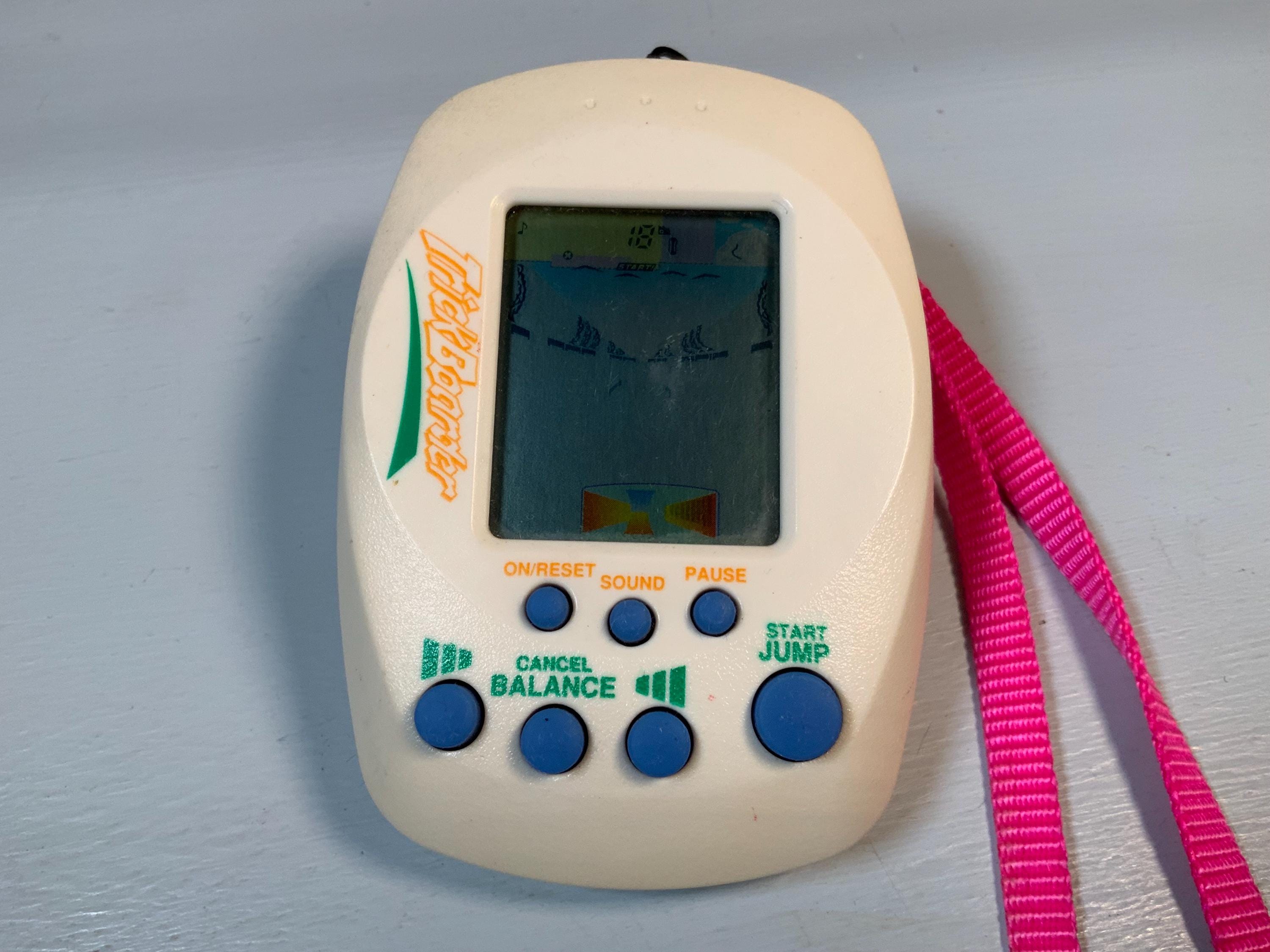 Bandai Trick Boarder LCD Game: 1997 Snowboarding Handheld Toy