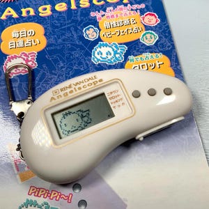 ヴィンテージ 1997 バンダイ たまごっち ゴッチ エンジェル Ver