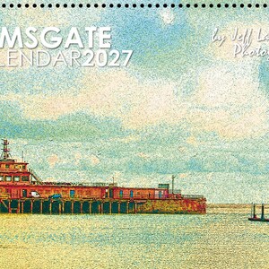 May include: A 2027 wall calendar featuring a stylized, textured illustration of a long, red pier structure extending into the water at Ramsgate. The text RAMSGATE CALENDAR 2027 and by Jeff Laurents Photography is printed in white against a blue sky.