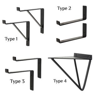 May include: Four different types of black metal shelf brackets. Type 1 and 3 are L-shaped brackets. Type 2 is a double L-shaped bracket. Type 4 is a triangular bracket.