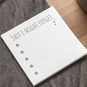 May include: White notepad with the text "SHIT I MIGHT FORGET" and a small arrow pointing to the right. There are six bullet points below the text.