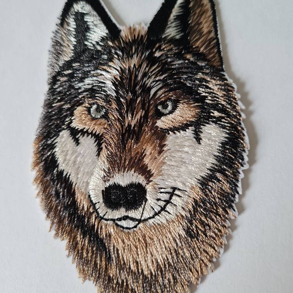 Wolfskopf als Stickbild und andere Stick und Foliebilder zum Aufbügeln auf Textilien, Applikationen zur Freude von Kindern und Erwachsenen