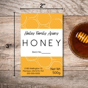 Honey Labels with yellow background and honeycomb image. Black lettering on a white background.