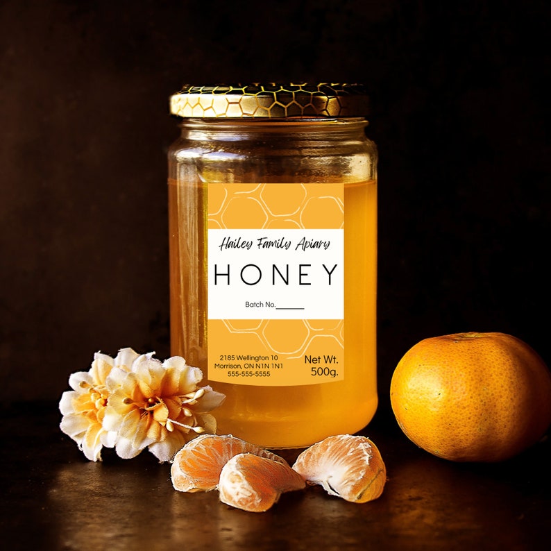 Honey Labels with yellow background and honeycomb image. Black lettering on a white background. Shown on a honey jar.