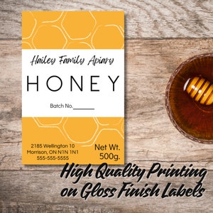 Honey Labels with yellow background and honeycomb image. Black lettering on a white background.